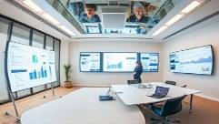 intuitive email workflow, effortless management, organizing tasks, photorealistic, shared office with interactive boards, highly detailed, real-time data analytics shown, crystal clarity, minimalist aesthetics, soft overhead lighting, shot with a fish-eye lens.